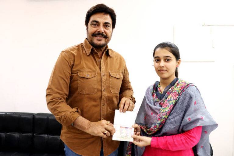 Guggu Gill With An Visa Applicant