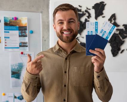 A Man Showing Couple Visas- Skybird International