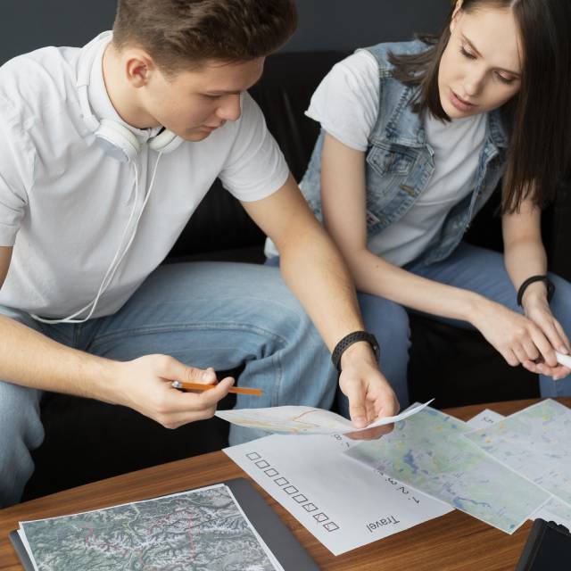 Skybird International- Two Guys Choosing Location for Travelling