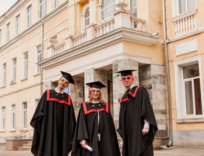Two Girls on Study Visa- Standing in College Dress